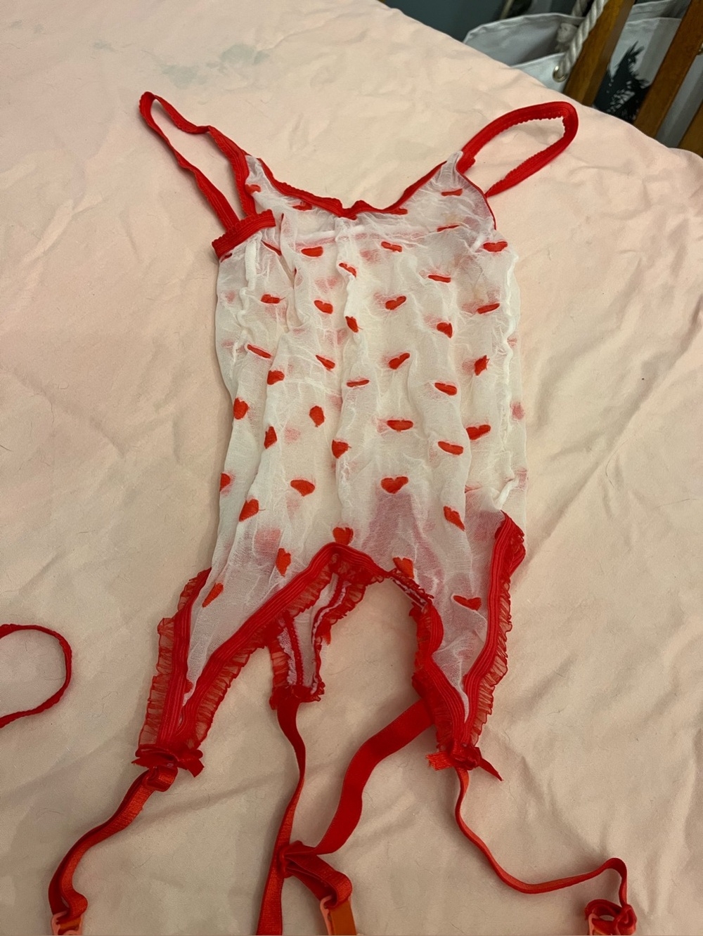 White and red hearts, one piece with garters, and stockings and thong.